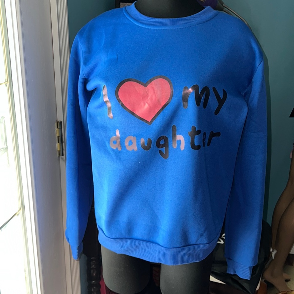 NWOT, BLUE Sweatshirt says across front “I LOVE (heart shape) MY DAUGHTER”